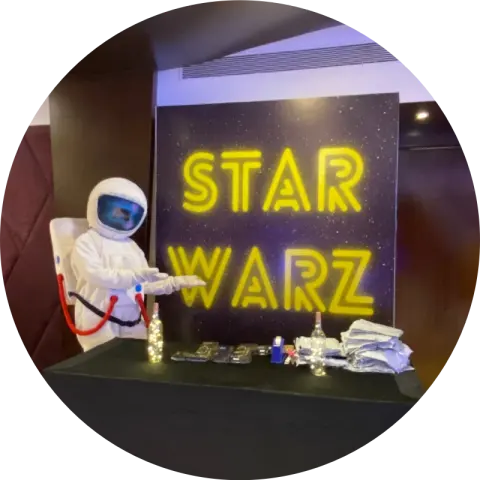 Children in astronaut costumes on a Space Explorers birthday mission
