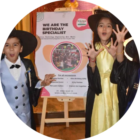 Children in wizard hats solving a riddle at a Science of Wizards party